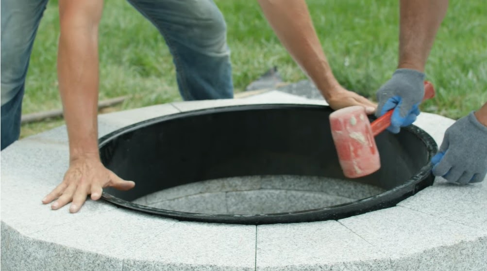 Polycor Hardscapes & Masonry how to install a Woodbury Gray 48” diameter, two-tier fire pit over an existing granite paver patio