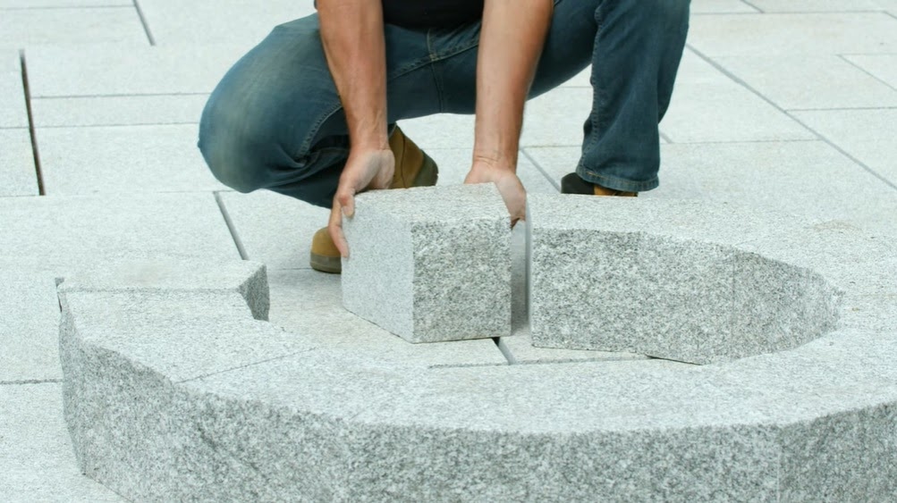 Polycor Hardscapes & Masonry how to install a Woodbury Gray 48” diameter, two-tier fire pit over an existing granite paver patio