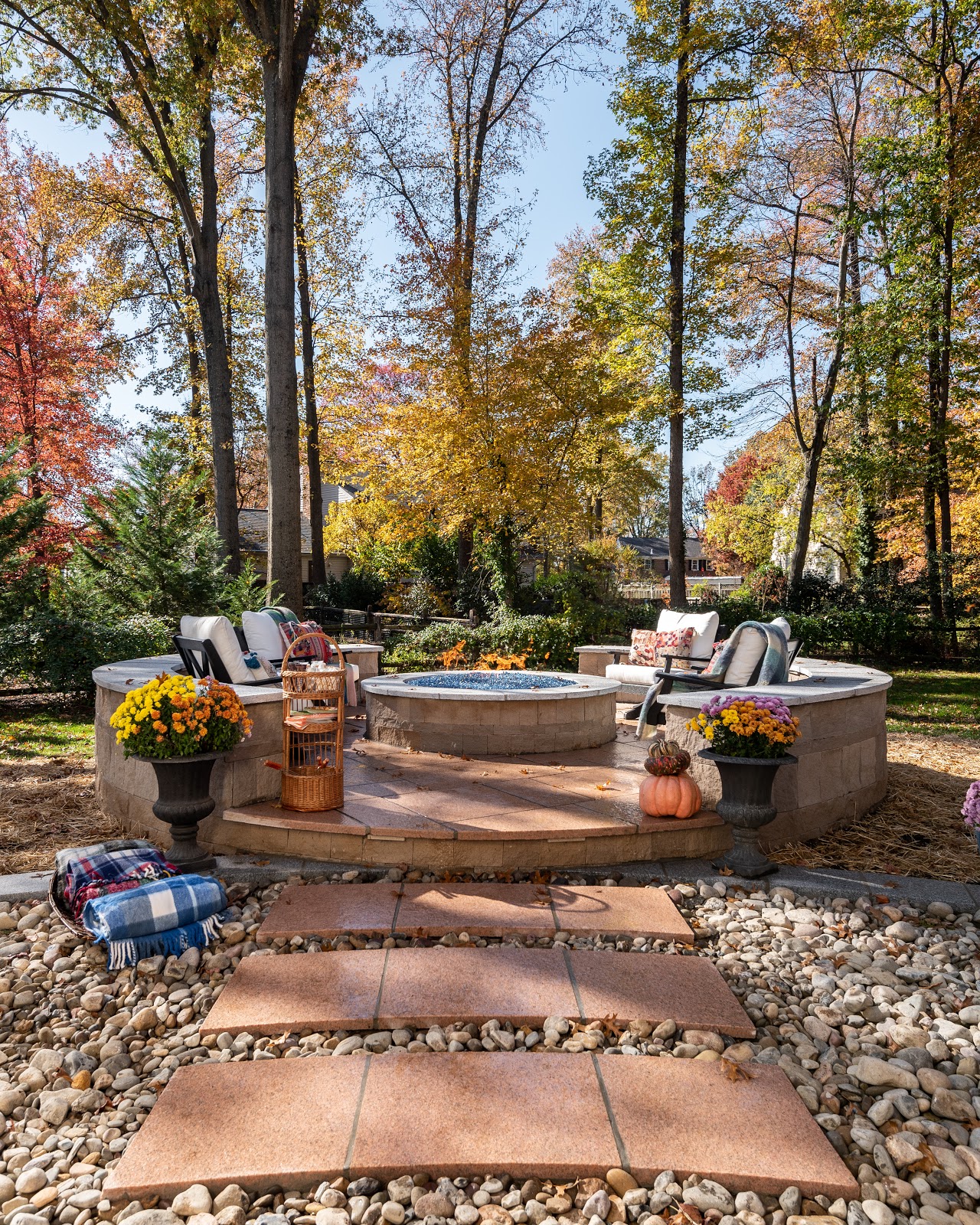 Photo of the fire pit and walkway in Sara Raak's backyard