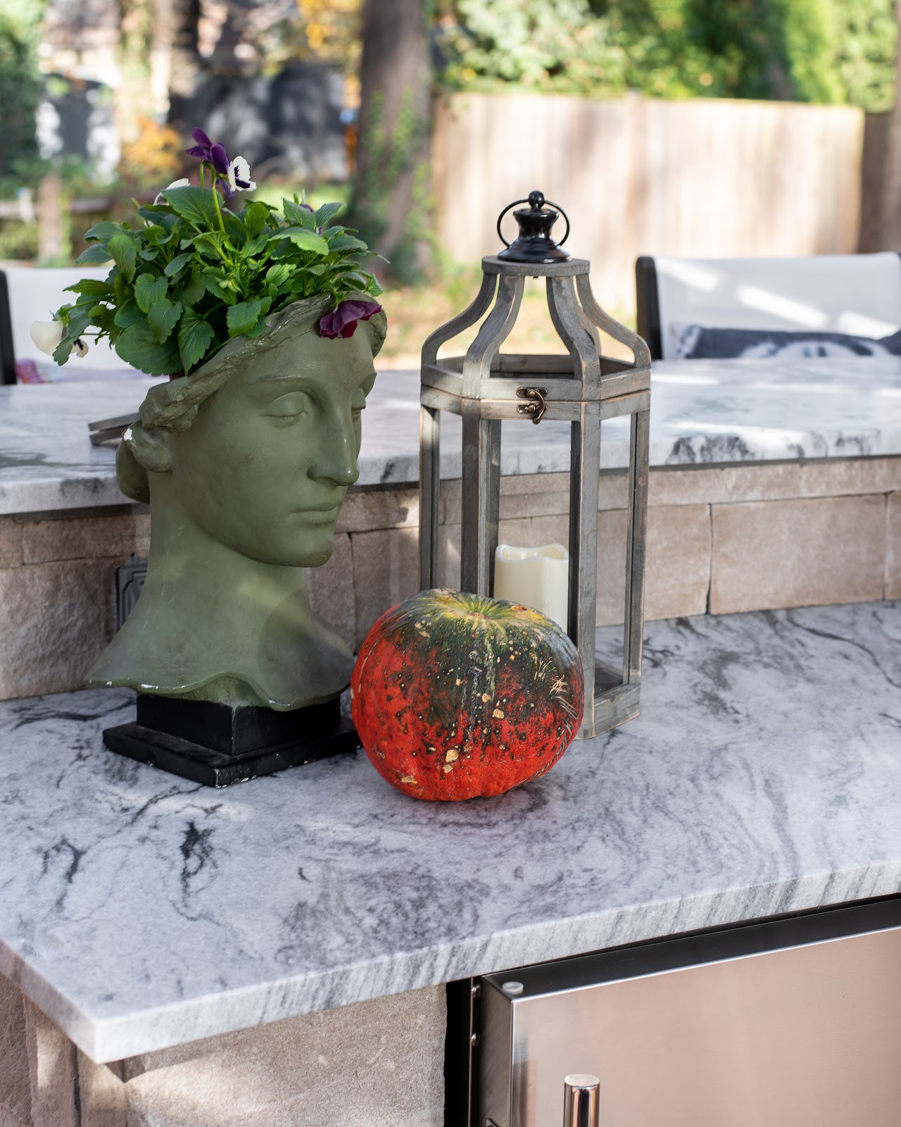 Photo of Pearl Grey marble countertops in the outdoor kitchen space