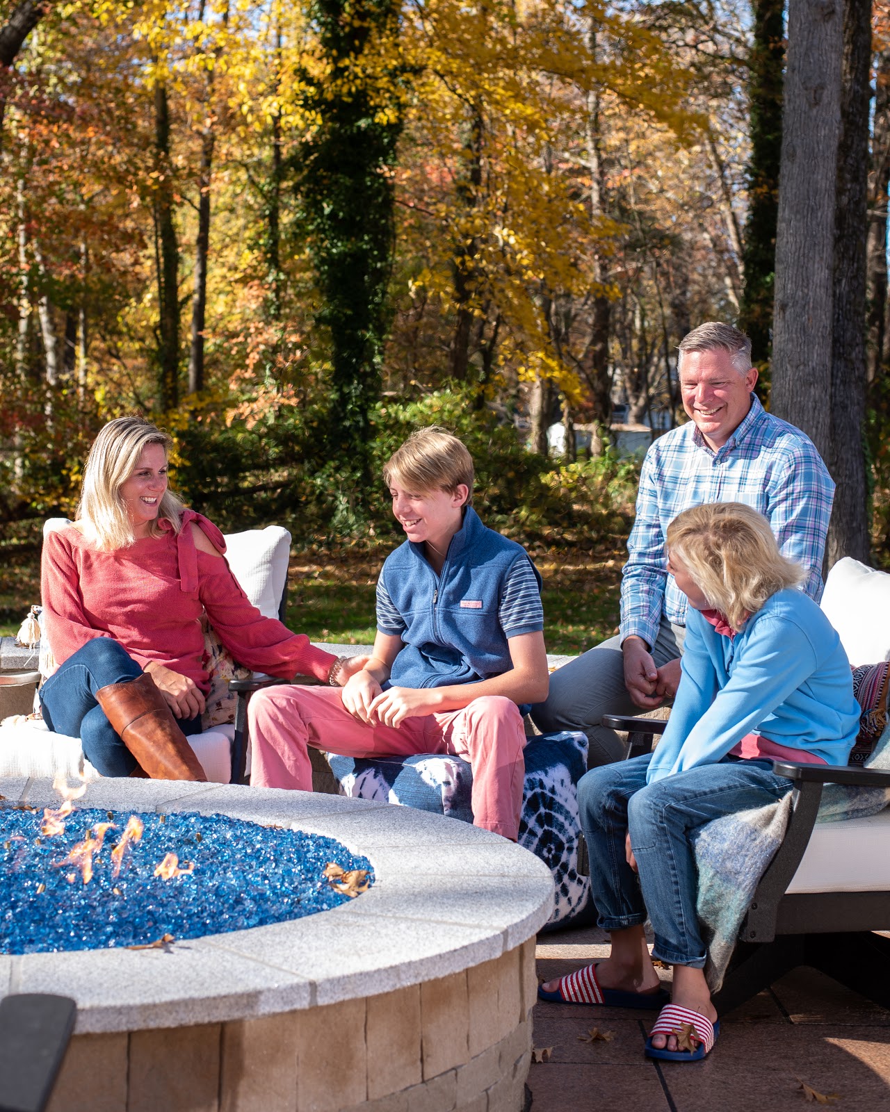 photo of the family around the fire pit