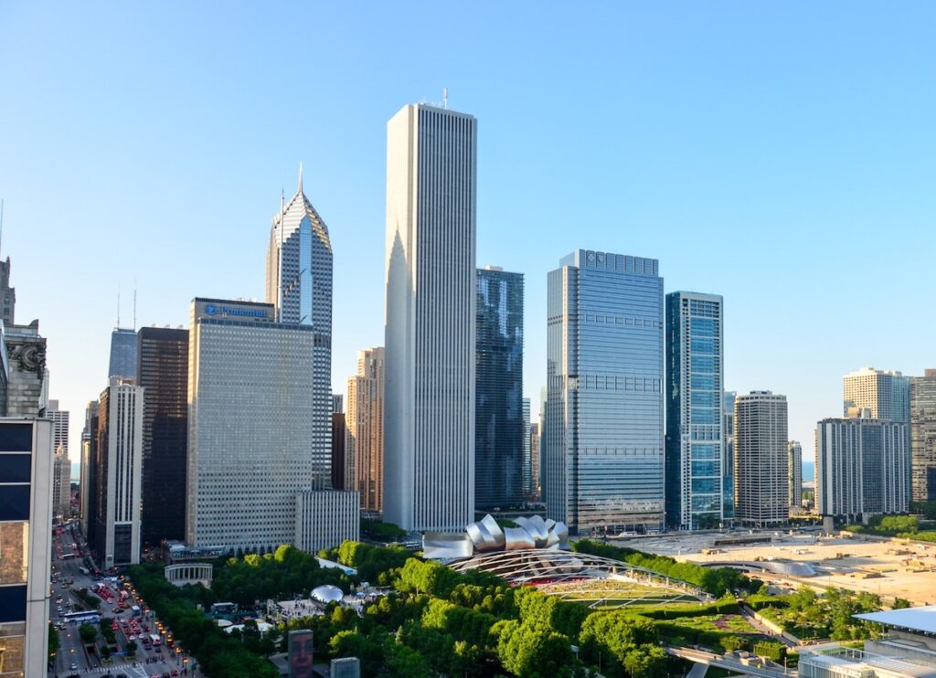 Chicago skyline with view of Aon Building centered and white mount airy granite facade visible