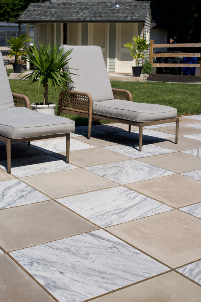 checkerboard patio designed by Jaclyn Isaac using Indiana Limestone and Georgia Marble