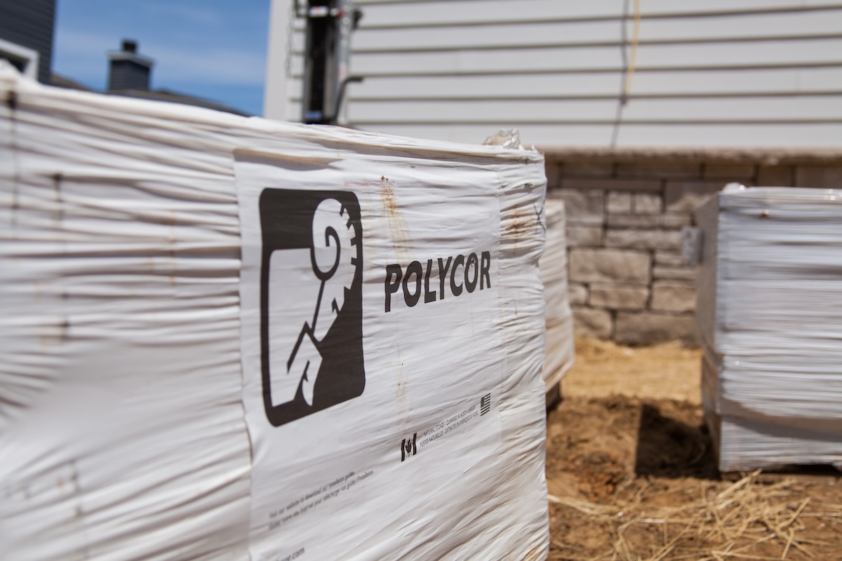 Pallet of Polycor natural stone pavers ready for installation