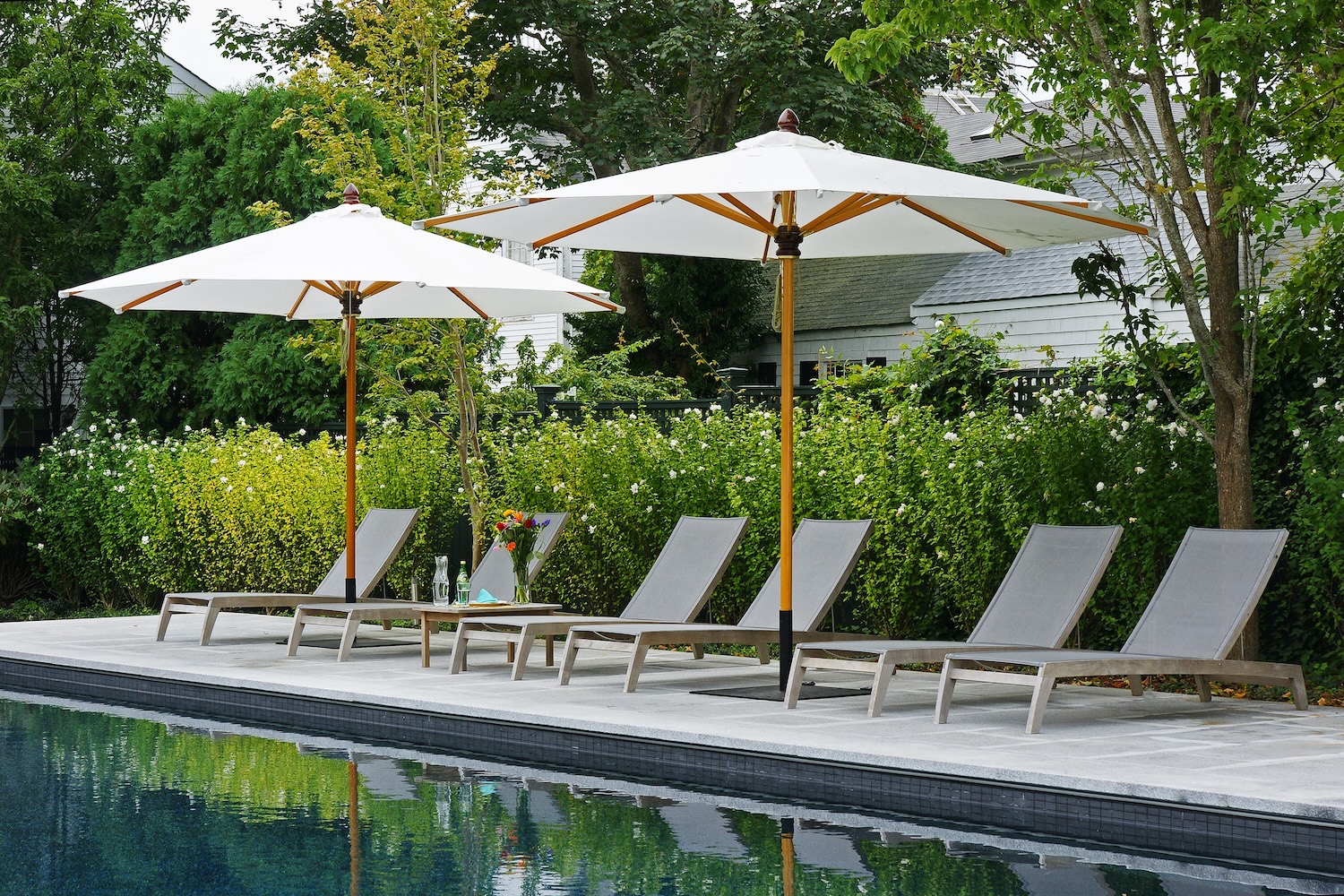 Woodbury Gray granite pavers surrounding a New Hampshire pool deck
